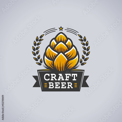 Label design with hop graphic surrounded with wreath and banner with craft beer text. Vector illustration in retro woodcut style