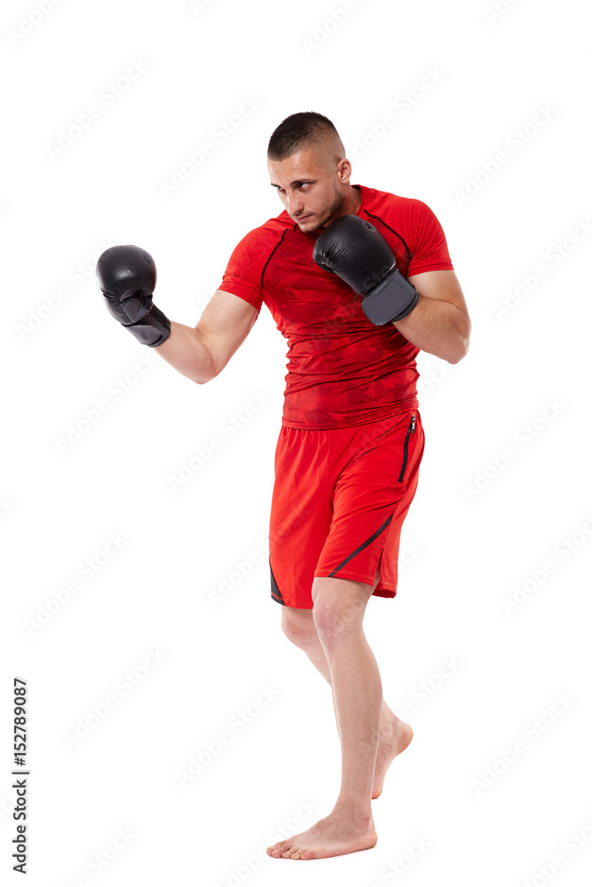 Young kickbox fighter on white