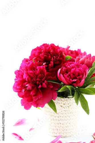 Fototapeta Naklejka Na Ścianę i Meble -  Bouquet of red peony flowers on a white wooden table