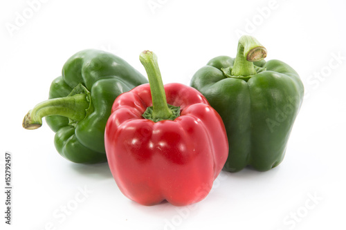 Fototapeta Red and green capsicum or sweet pepper isolated on white background