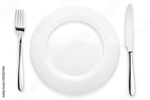 Empty plate, fork, knife, clipping path, white background, isolated, top view from first person