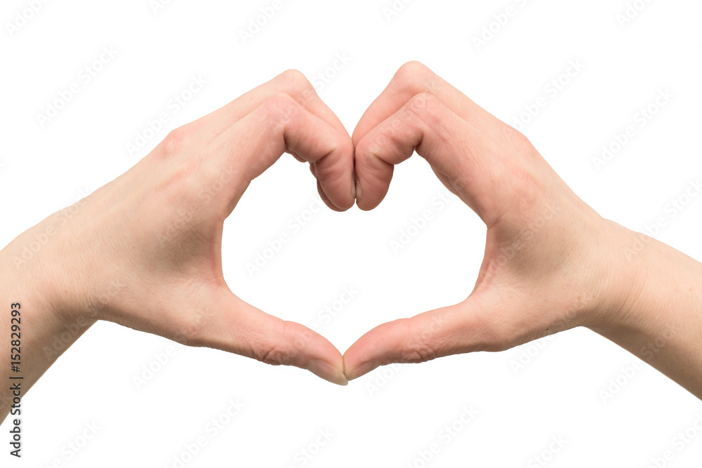 Hands of a woman stacked in the shape of a heart - isolated on a white background Hands of a woman stacked in the shape of a heart - isolated on a white background