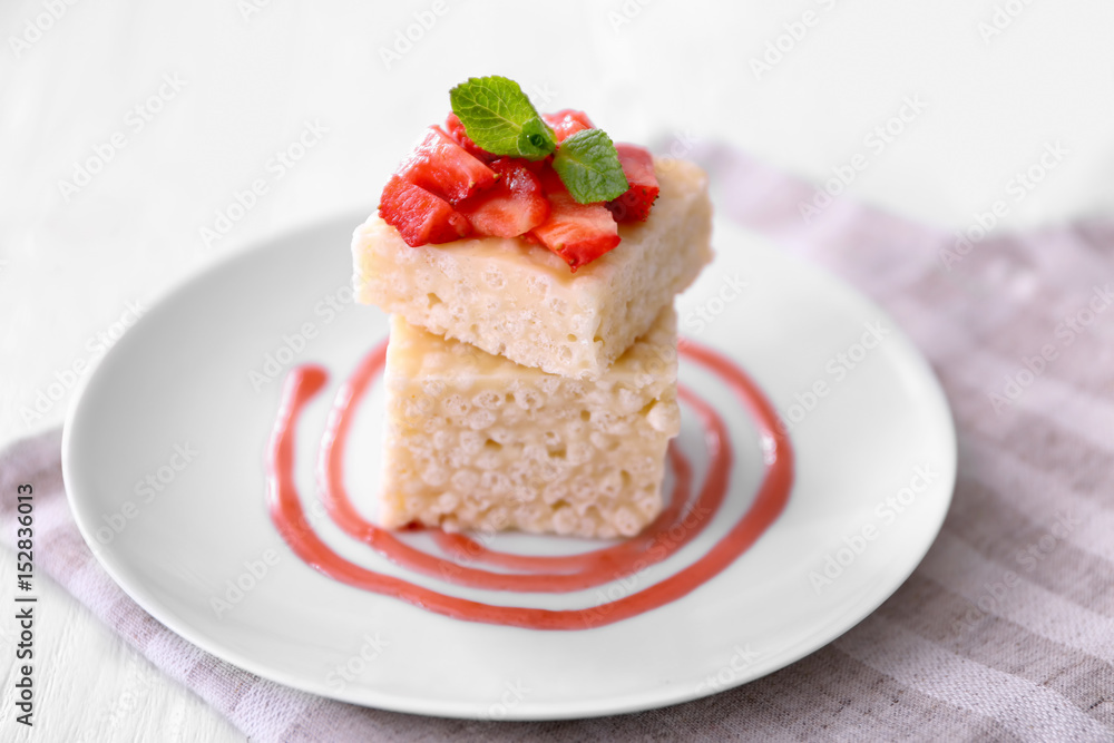Delicious crispy dessert with strawberry on plate Delicious crispy dessert with strawberry on plate