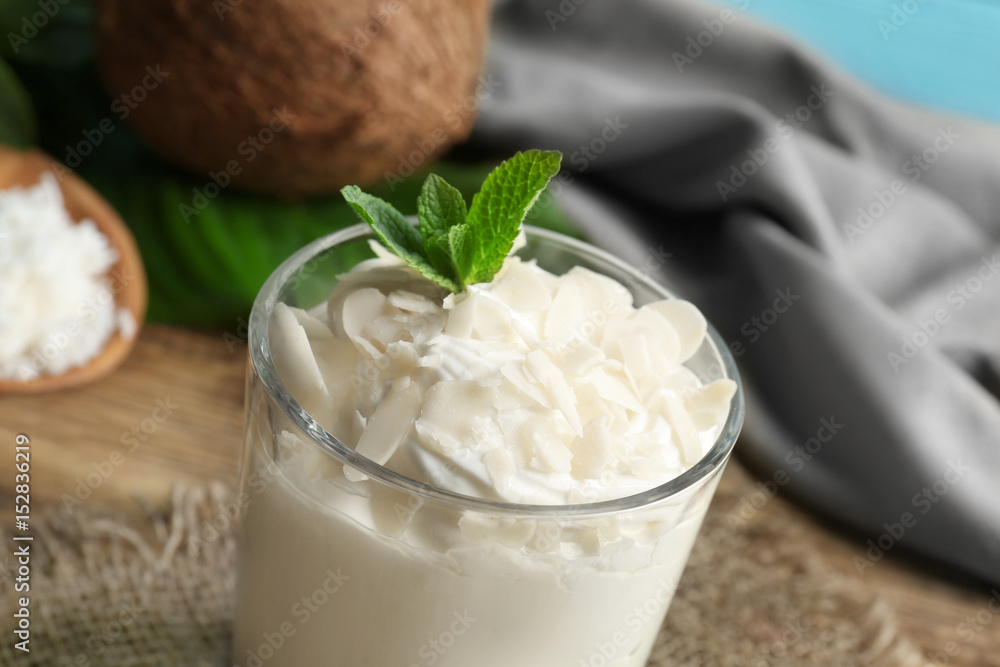 Delicious coconut cream dessert in glass, closeup Delicious coconut cream dessert in glass, closeup