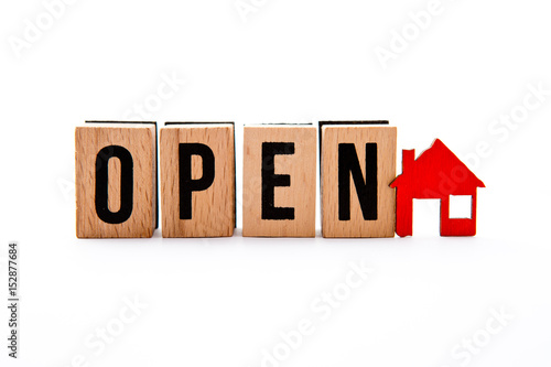 Open House - wooden block letters with red house icon - white background 
