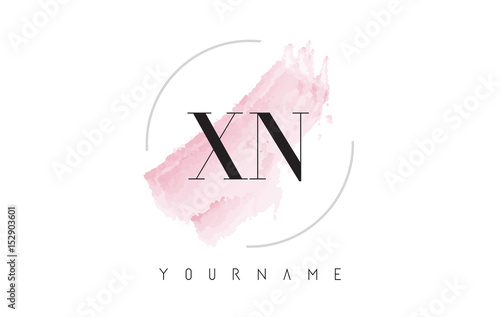 XN X N Watercolor Letter Logo Design with Circular Brush Pattern. photo