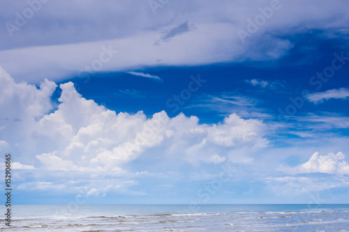 Clouds in the bright blue sky over sea © Satakorn