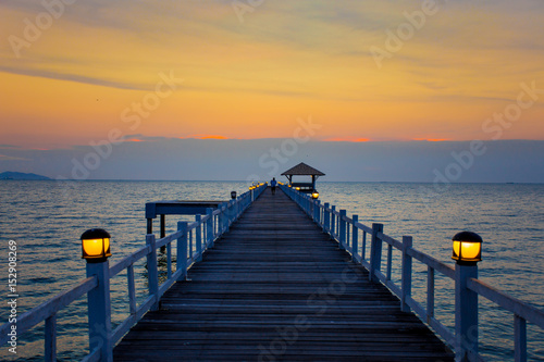 The wooden bridge on sea at sunset  Thailand.