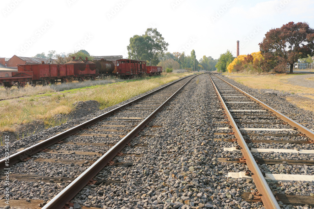 Fototapeta premium country railway station and old railway carriages