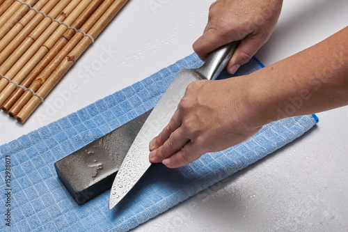 Handle the knife to make a sharp knife with a whetstone.