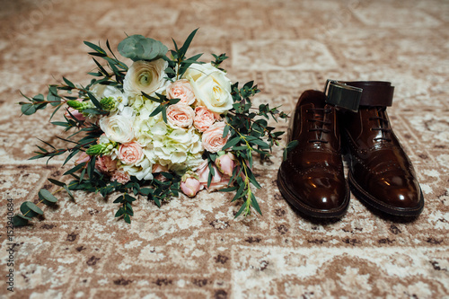 wedding bouquet with man shoes