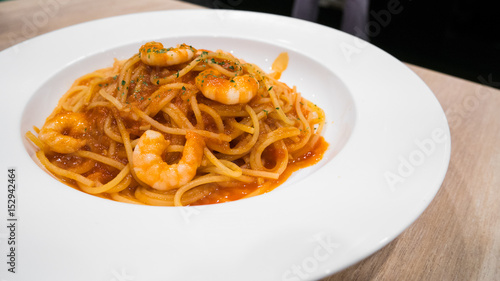 Spaghetti shrimp sauce in modern italian restaurant.