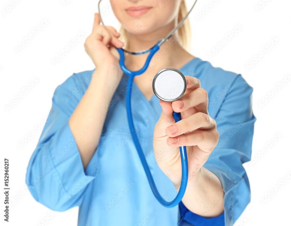 Young medical assistant with stethoscope on white background, closeup