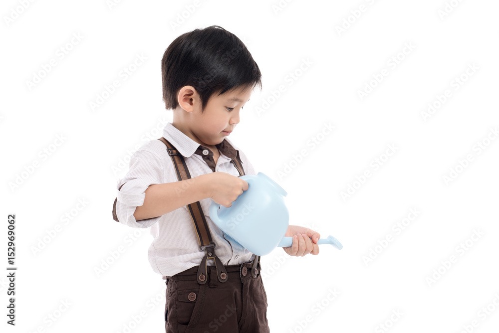Cute Asian child holding blue watering on white background isolated Cute Asian child holding blue watering on white background isolated