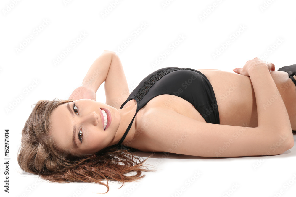 Beautiful young woman in swimsuit on white background Beautiful young woman in swimsuit on white background
