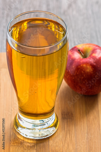 Fresh Apple juice with a red Apple