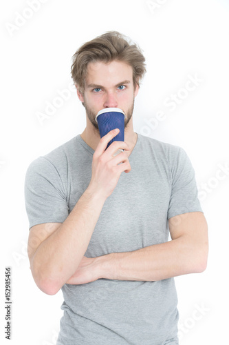 young handsome man drink from takeaway coffee or tea cup