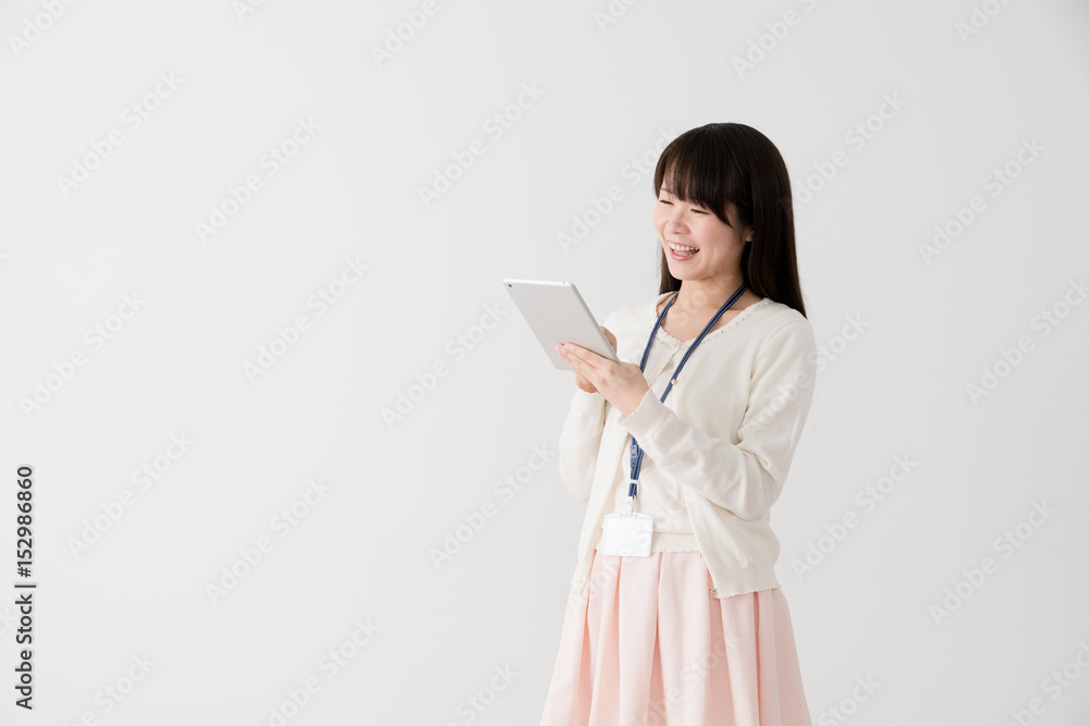 タブレットを持つビジネスウーマン タブレットを持つビジネスウーマン