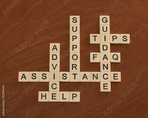 Crossword puzzle with words Support, Help, FAQ, Assistance. Customer care concept.