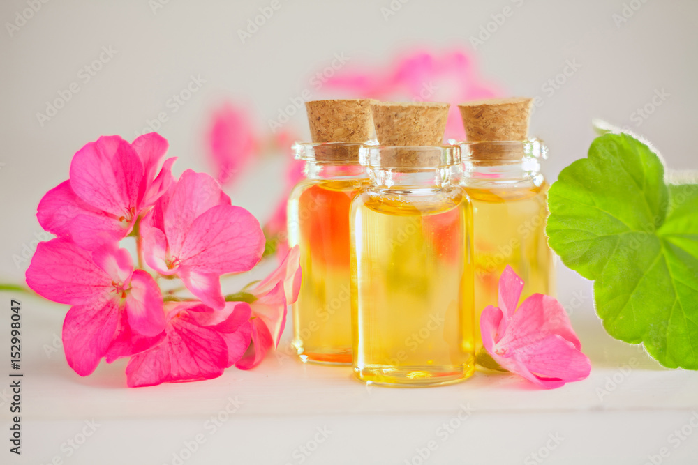 Essence of flowers on table in beautiful glass jar Essence of flowers on table in beautiful glass jar
