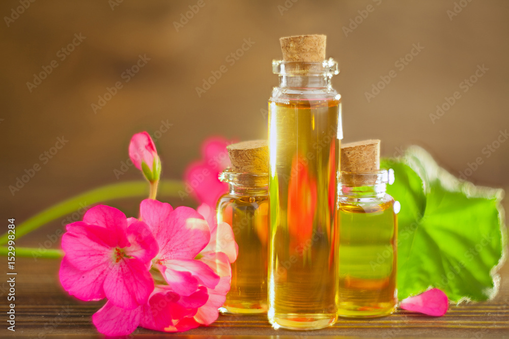 Essence of flowers on table in beautiful glass jar Essence of flowers on table in beautiful glass jar