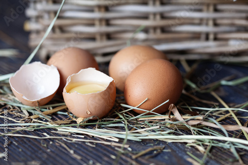 Chicken eggs on a wooden table