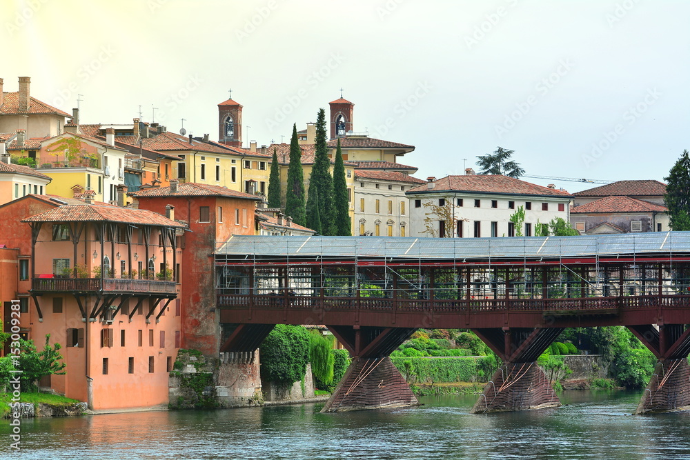 The historic wooden bridge in the town of Bassano in Italy on the river Brenta.