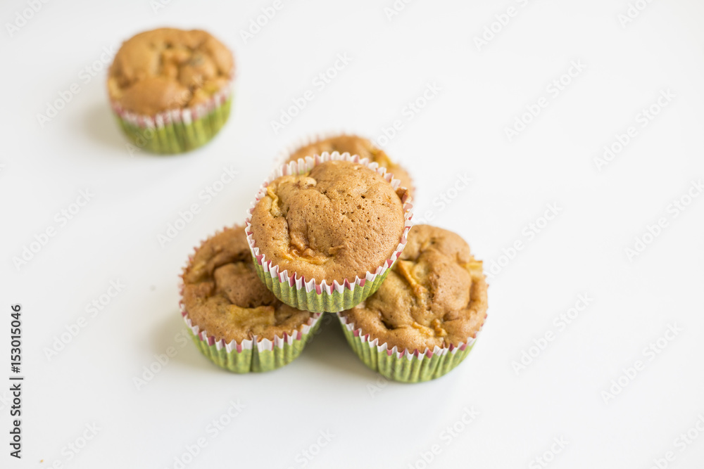wholegrain muffins with apples on a dark wood background. tinting. selective focus wholegrain muffins with apples on a dark wood background. tinting. selective focus
