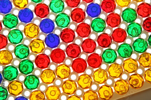 Rectangular rows and columns of colorful plastic pins