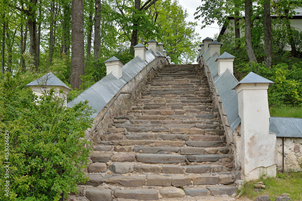 A stone staircase in the Uspensky Svyatogorsky monastery, Pushkinskaya Street