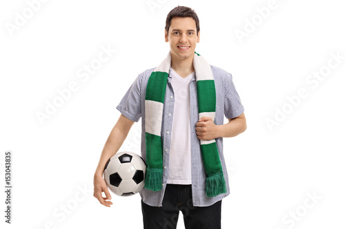 Young soccer fan with a scarf and a football © Ljupco Smokovski