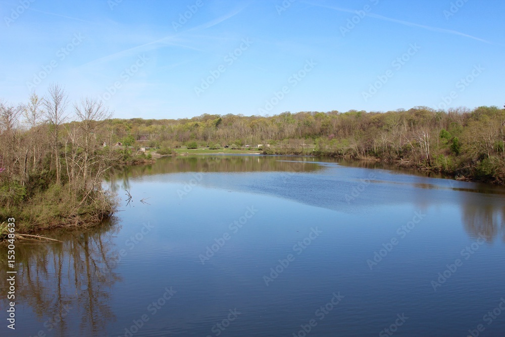 The wide lake and the park landscape. The wide lake and the park landscape.