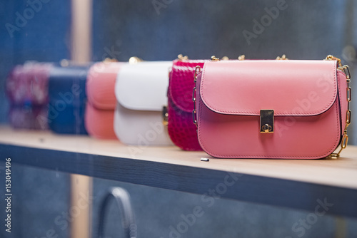 Woman purses in a store in Paris. photo