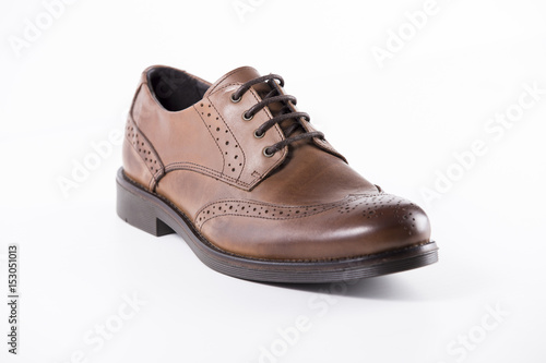 Male Brown Shoes Leather on White Background, Isolated Product, Top View, Studio.