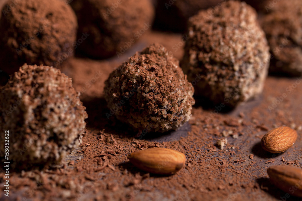 Chocolate candy truffles on a dark background Chocolate candy truffles on a dark background