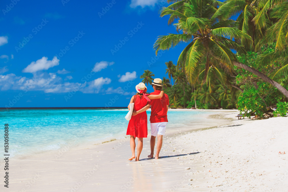happy loving couple walking on beach happy loving couple walking on beach