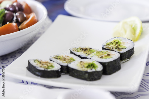 Plate with sushi rolls