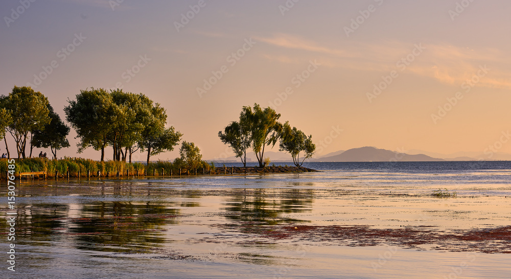 Beautiful serene lake evening light at sunset Beautiful serene lake evening light at sunset