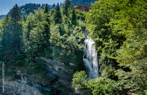 Beautiful Reichenbach falls (Reichenbachfall) at Swiss Alps, Switzerland photo