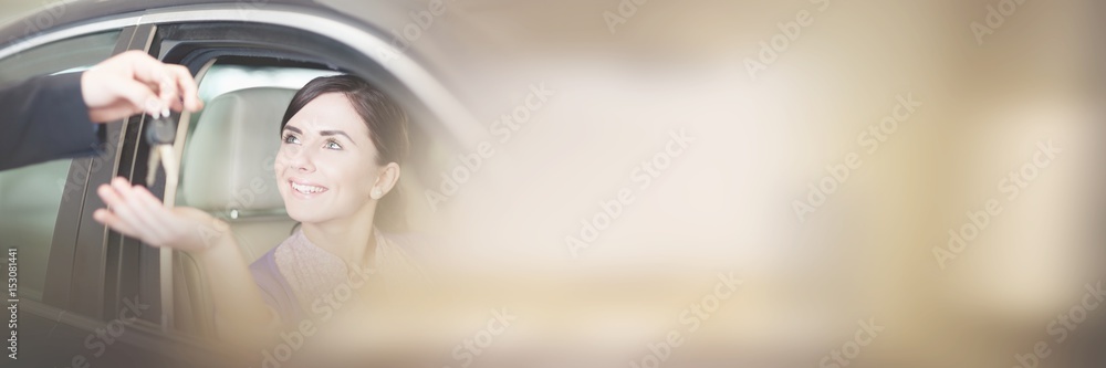 Woman smiling while sitting in car Woman smiling while sitting in car