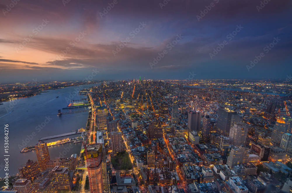 Manhattan midtown skyline panorama at night time, New York, USA