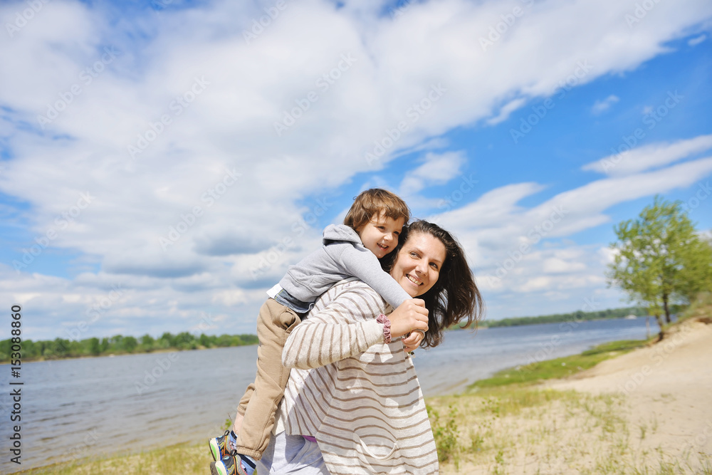 The girl is playing with her son