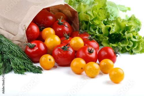 Fresh tomatoes Packed in paper box on white background.