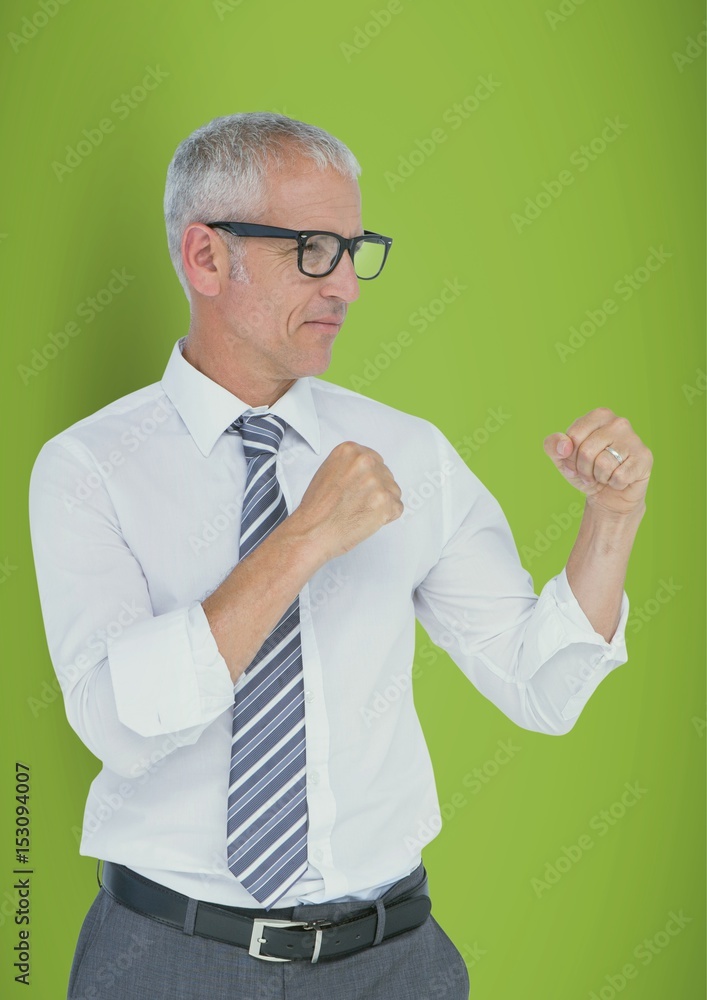 Confident businessman standing in fighting stance Confident businessman standing in fighting stance