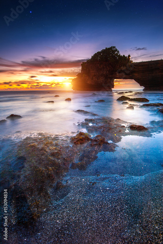 Tanah Lot Temple at sunset in Bali, Indonesia.