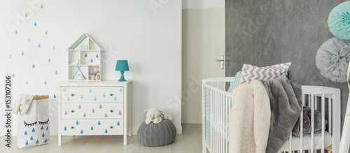 Childs room with white cot photo