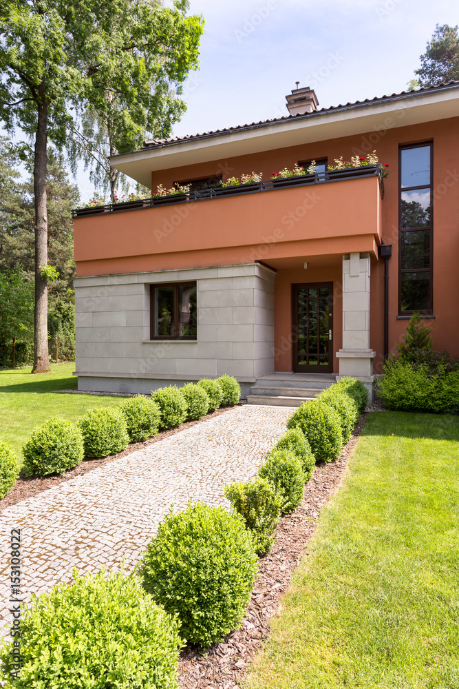Contemporary house exterior with pathway Contemporary house exterior with pathway