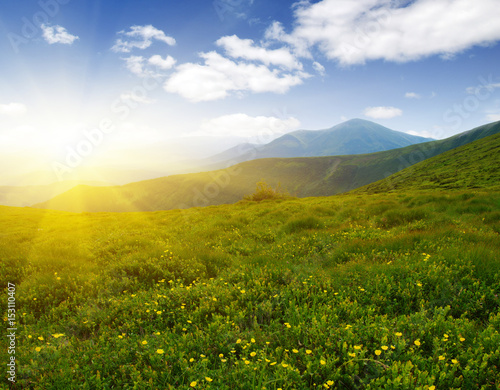 Mountain landscape on sun