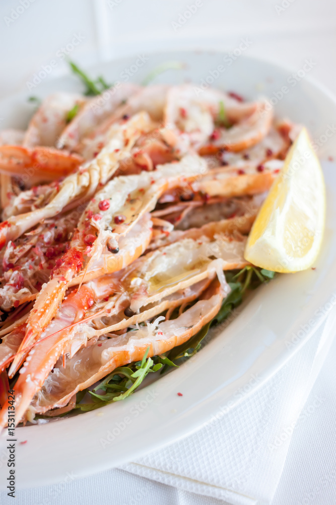 restaurant dish with raw shrimp