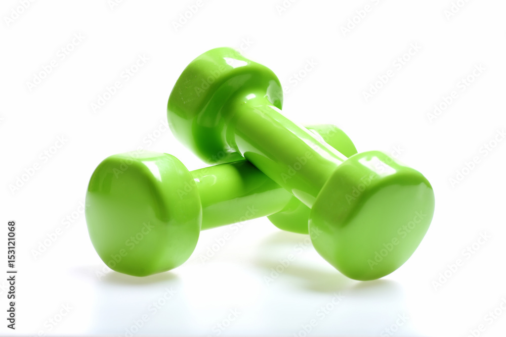 Dumbbells in green color isolated on white Dumbbells in green color isolated on white